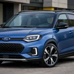 Niebieski Ford z nowoczesnymi światłami LED i czarnym dachem, jeden z nowych ford modele, stoi na ulicy.