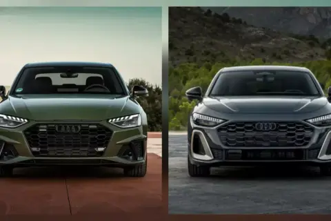 Dwa najnowsze Audi, zielone i ciemnoszare, prezentują swoje agresywne grille i nowoczesne reflektory.