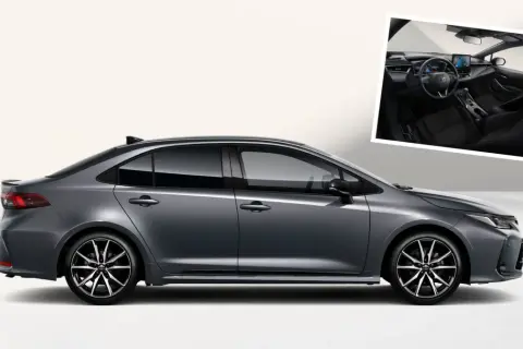 Nowoczesna Toyota Corolla 2026 w szarym kolorze, z widokiem na eleganckie wnętrze.