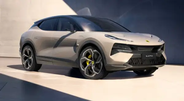 Nowoczesny, beżowy SUV Lotus Eletre z czarnym dachem i futurystycznymi felgami, gotowy na elektryzującą podróż.