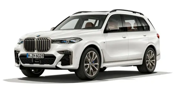 Białe BMW X8 z brązową tapicerką, eleganckie i luksusowe. Sprawdź aktualną bmw x8 cena.